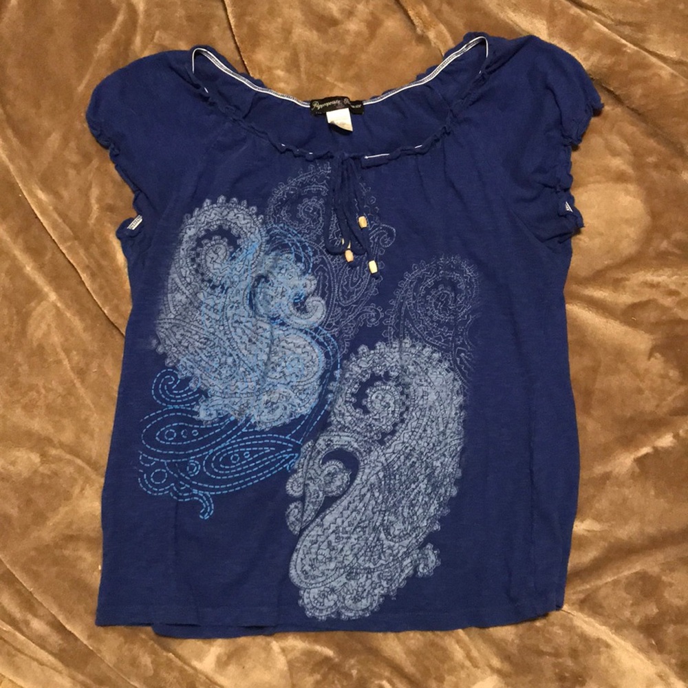 Blue top with fun design